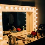 turn-on light white wooden vanity mirror